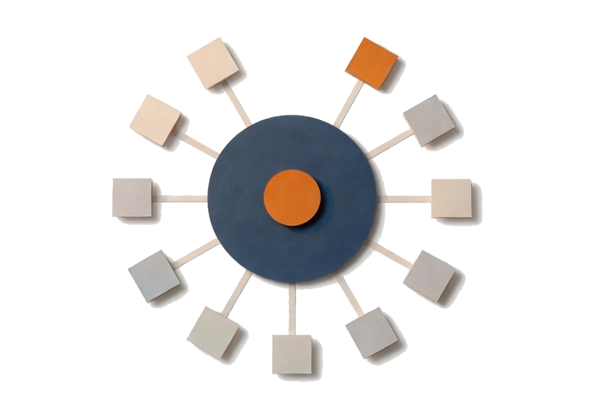Eleven cut-paper tiles ringed around a single raised centre, with one position left empty